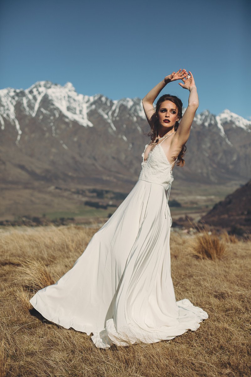 NZ High Country wedding venue with views of The Remarkables and bride wearing Rue De Seine Mackenzie gown
