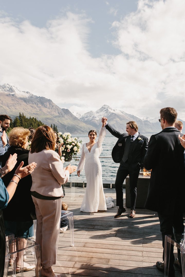 Bride and groom on rooftop terrace at the Eicahrdts Private Hotel Penthouse in Queenstown New Zealand by Dawn Thomson Photography