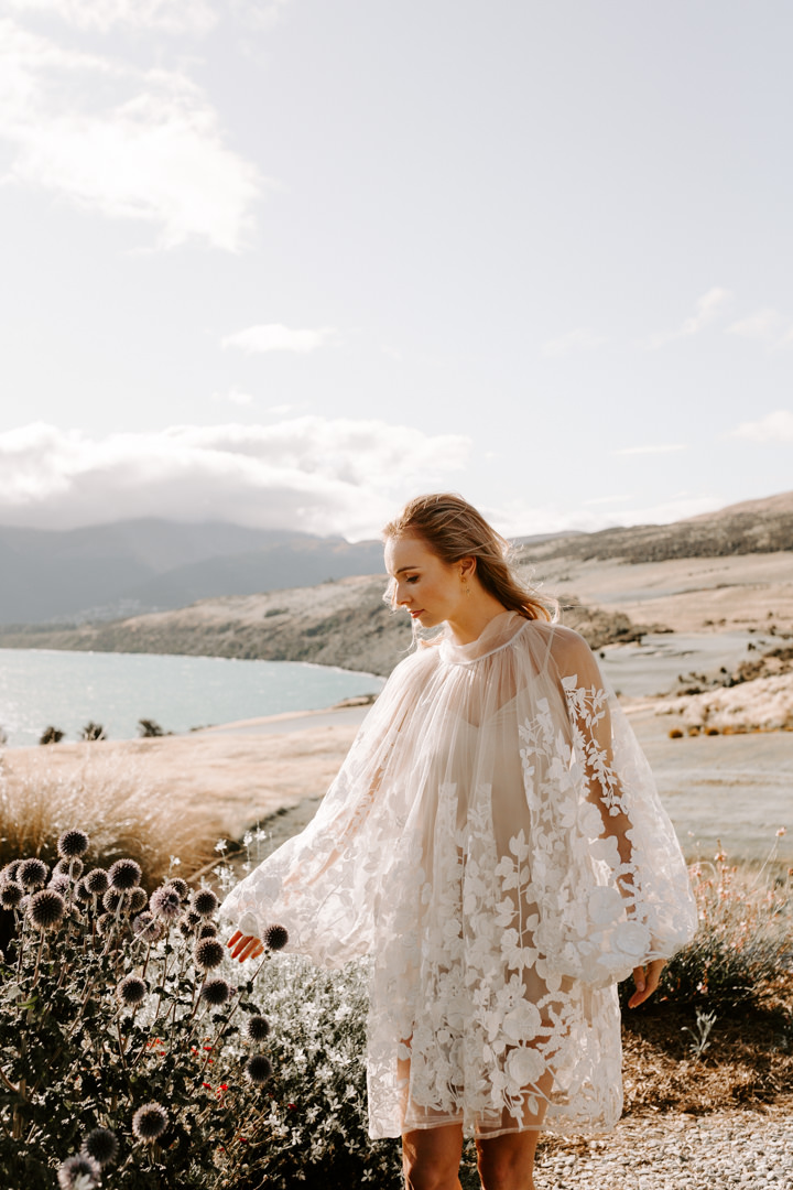 Bride wears Brooke Tyson Flora gown at Jacks Retreat Elopement Wedding in Queenstown, New Zealand by Dawn Thomson Photography